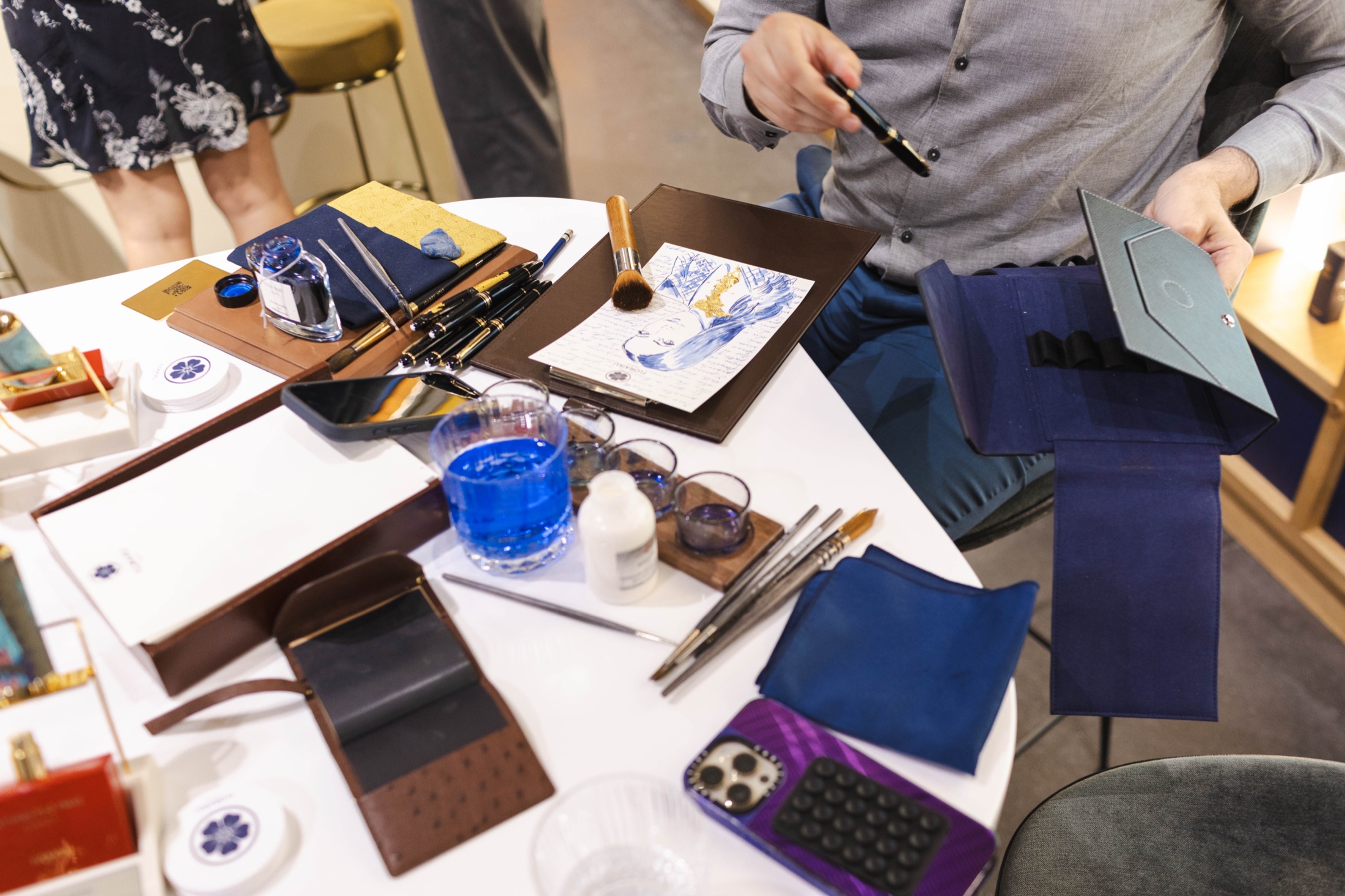 Drawing tools and materials prepared for the Floraïku activation.