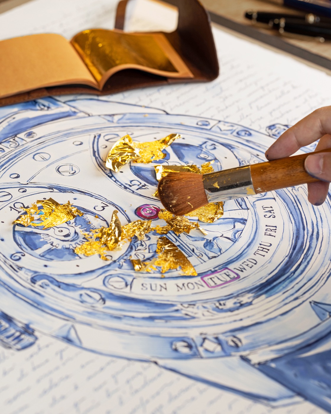 Gold leaf brushed onto the blue-ink Chaykin Golden Mask drawing.