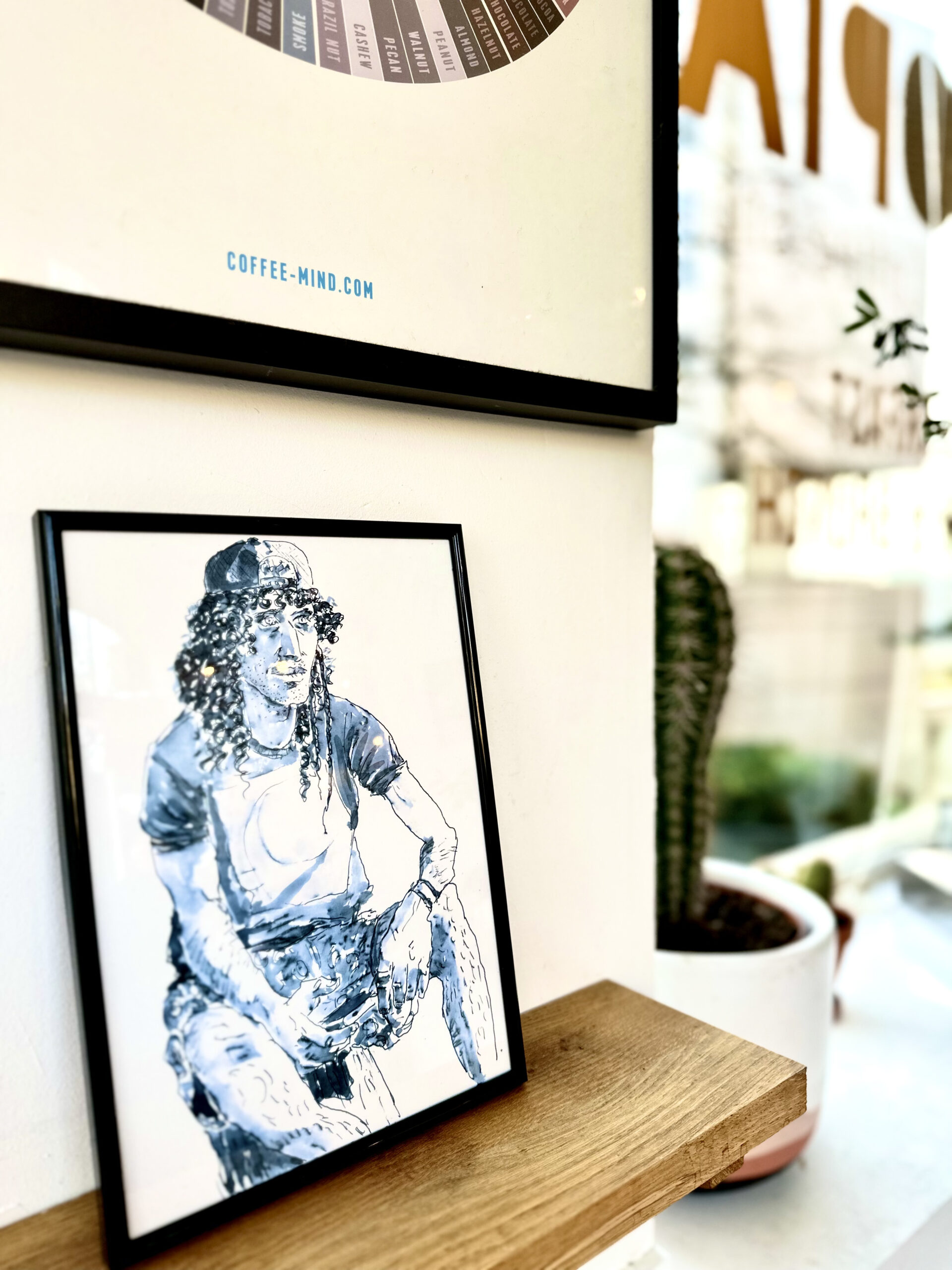 Framed Magnetic Blue Portrait at Utopia Coffee.