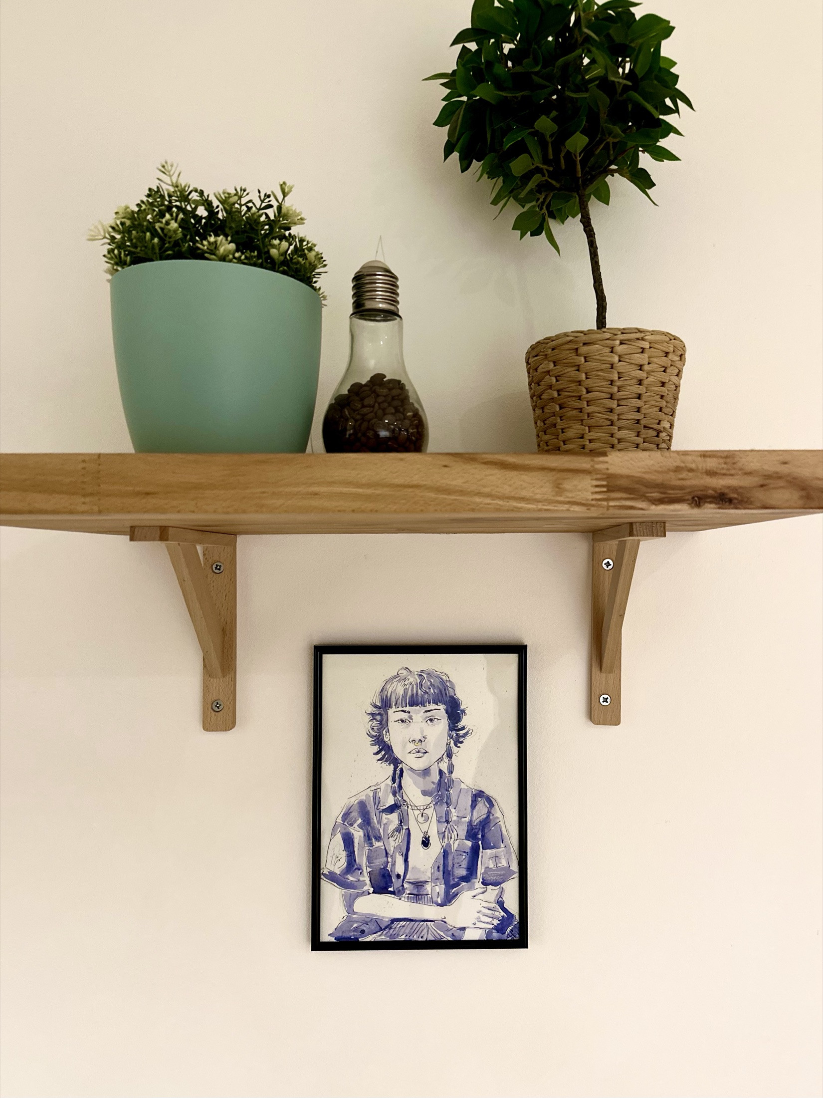 Framed work at Magnetic Blue Portraits at Madame.