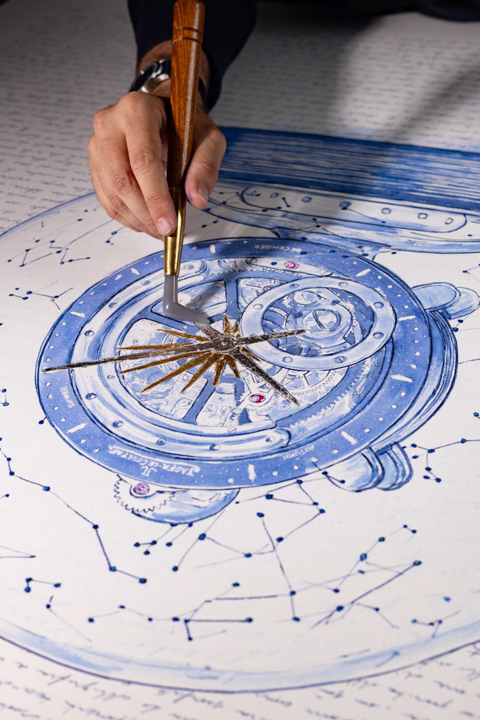 A palette knife working on the metallic rays at the centre of Atmos.