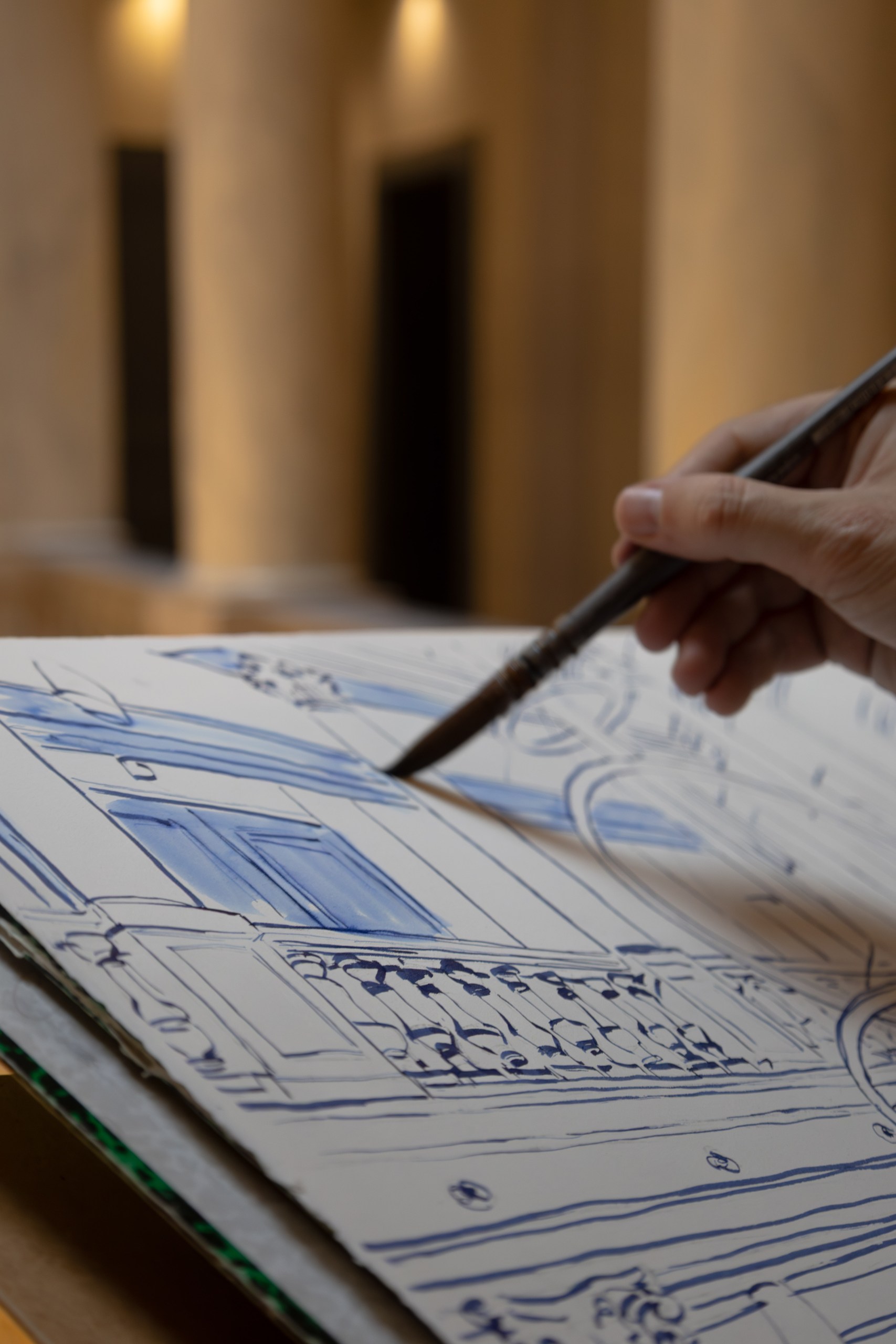 The chandelier drawing in progress during the Ritz-Carlton Geneva anniversary event.